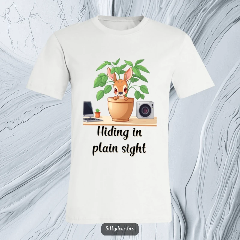 Funny Shy Deer T-Shirt depicting a deer peeking shyly from behind a potted plant on a desk, embodying gentle introversion.